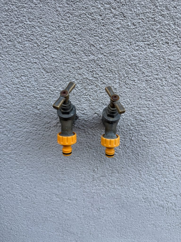 outside hot and cold tap installation